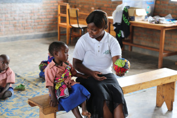 ©GPE/Alexandra Humme - VESTINE NYIRAZUBA, pre-school teacher in her classroom at the Jean de la Mennais School in Burera district in rural Rwanda; teaching a student (2016)