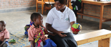 ©GPE/Alexandra Humme - VESTINE NYIRAZUBA, pre-school teacher in her classroom at the Jean de la Mennais School in Burera district in rural Rwanda; teaching a student (2016)