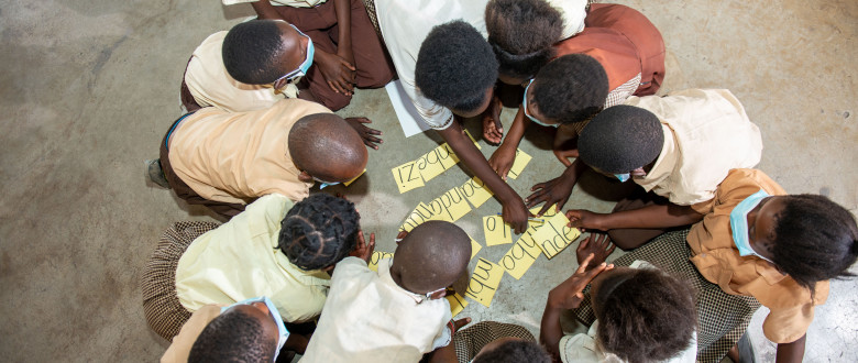 Children learning together in their class in Zambia