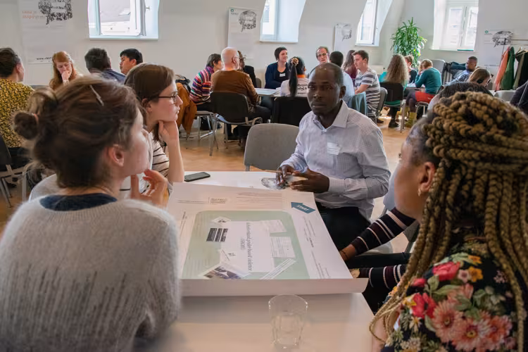 People debating at a table