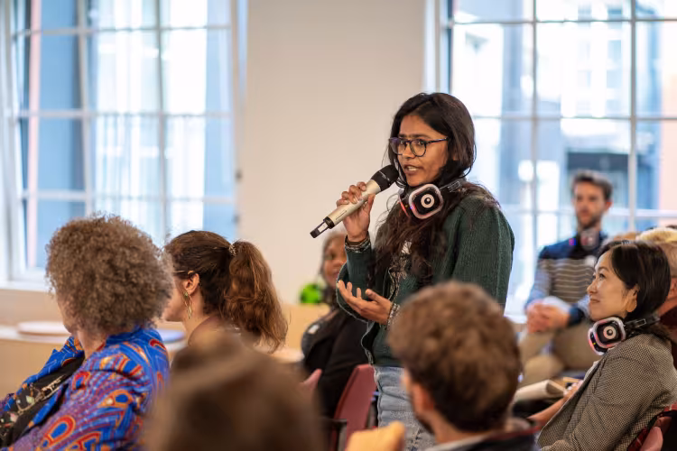 Lady speaking in microphone