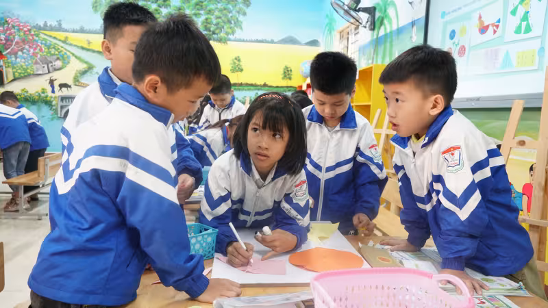 Chlidren play in a Vietnamese classroom