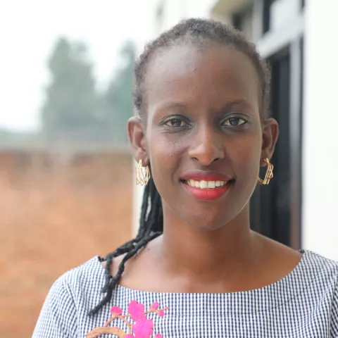 A portrait photo of Aline Karinganire