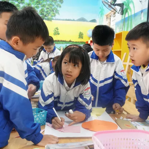 Chlidren play in a Vietnamese classroom